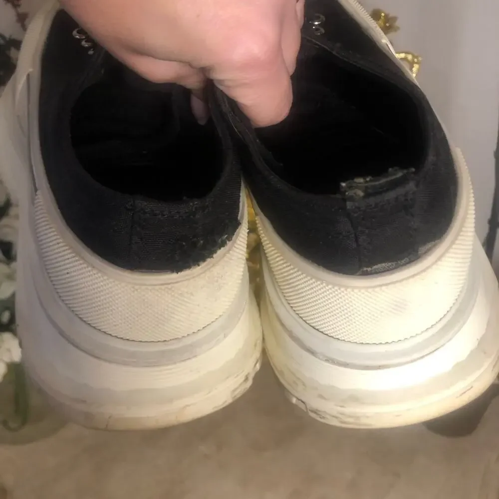 Alexander McQueen black and white platform chucks.